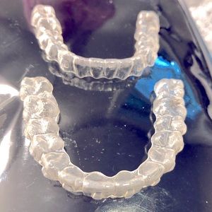 4 pair of used Invisalign teeth aligners
